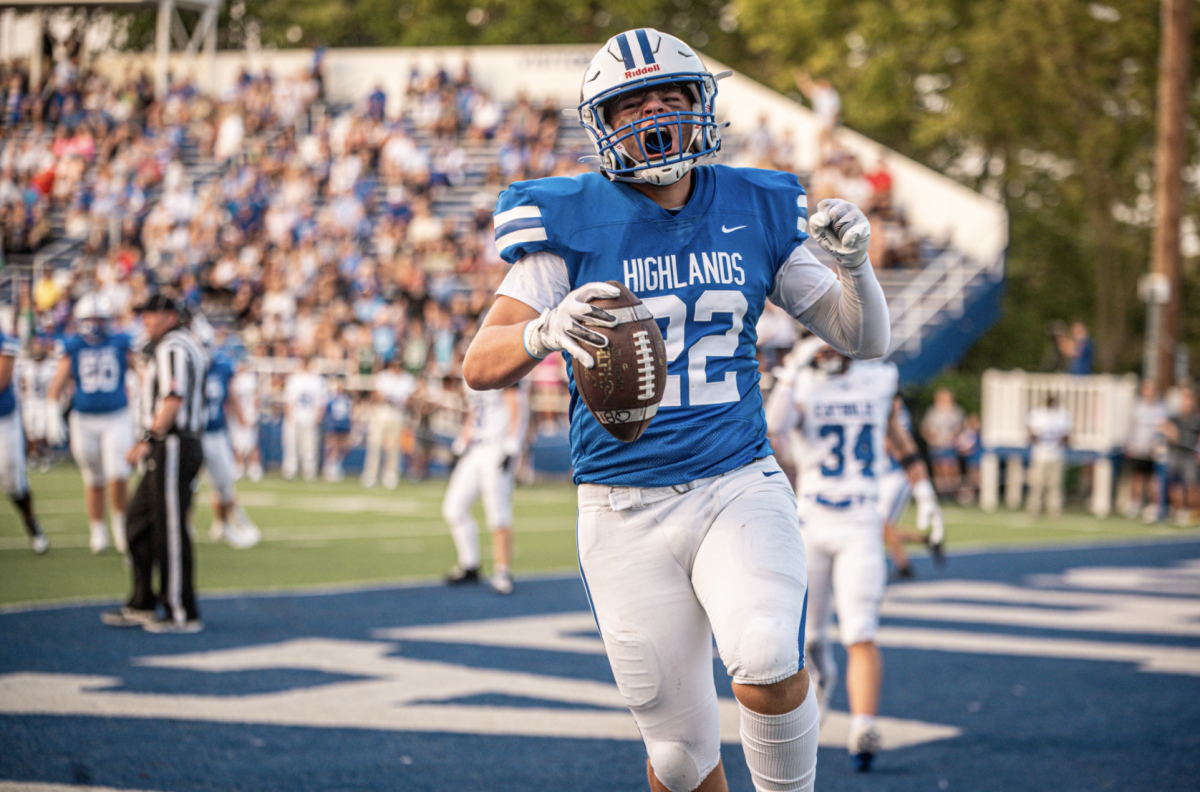 Tayden Lorenzon (10) celebrates after catching a pass for the two point conversion.